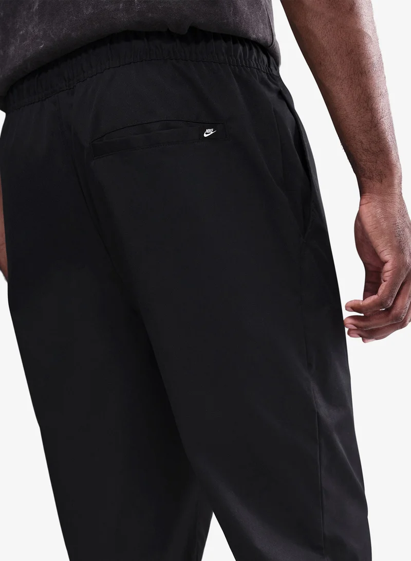 Nike BLACK/(WHITE) Club Taper Pant for Men | Best Price UAE