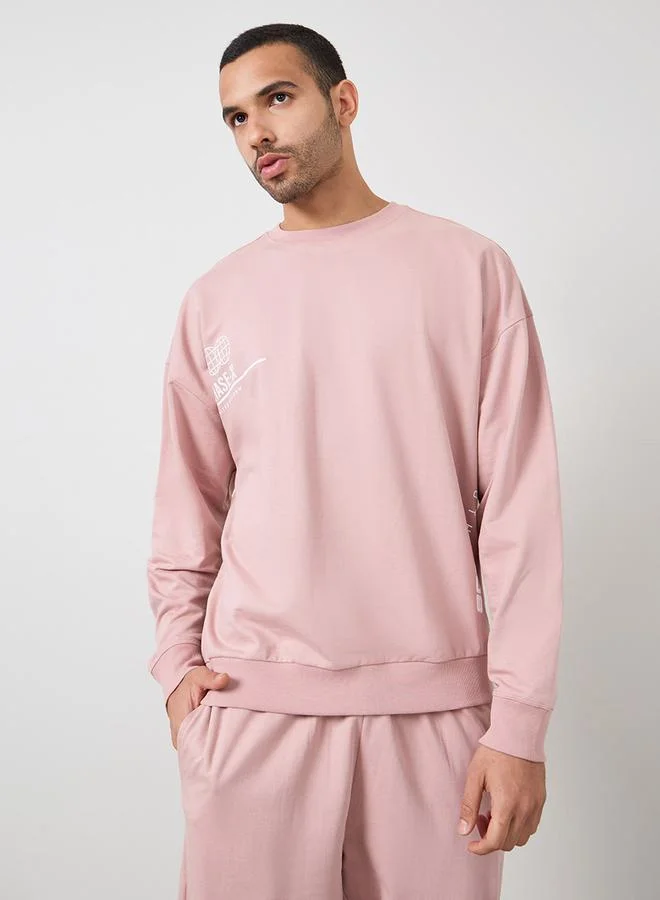 ستايلي Oversized Fleece Sweatshirt with Minimal Print