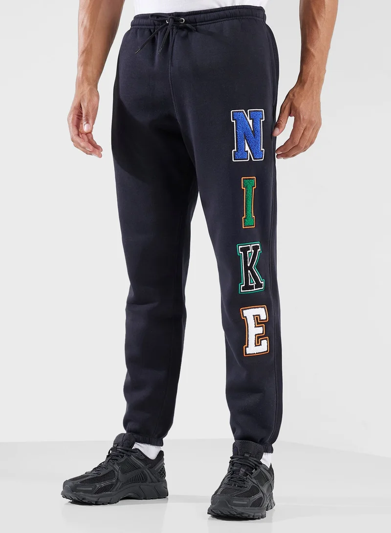 نايكي Nike Sportswear Club Men's Fleece Cuffed Trousers