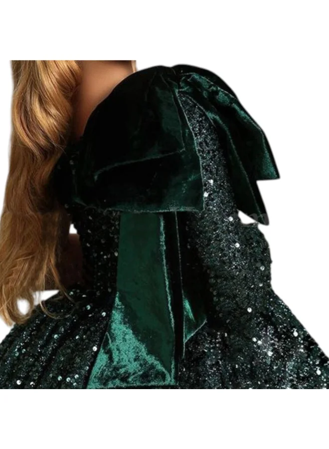 دىدانيالا فستان زمردي مرصع بالترتر