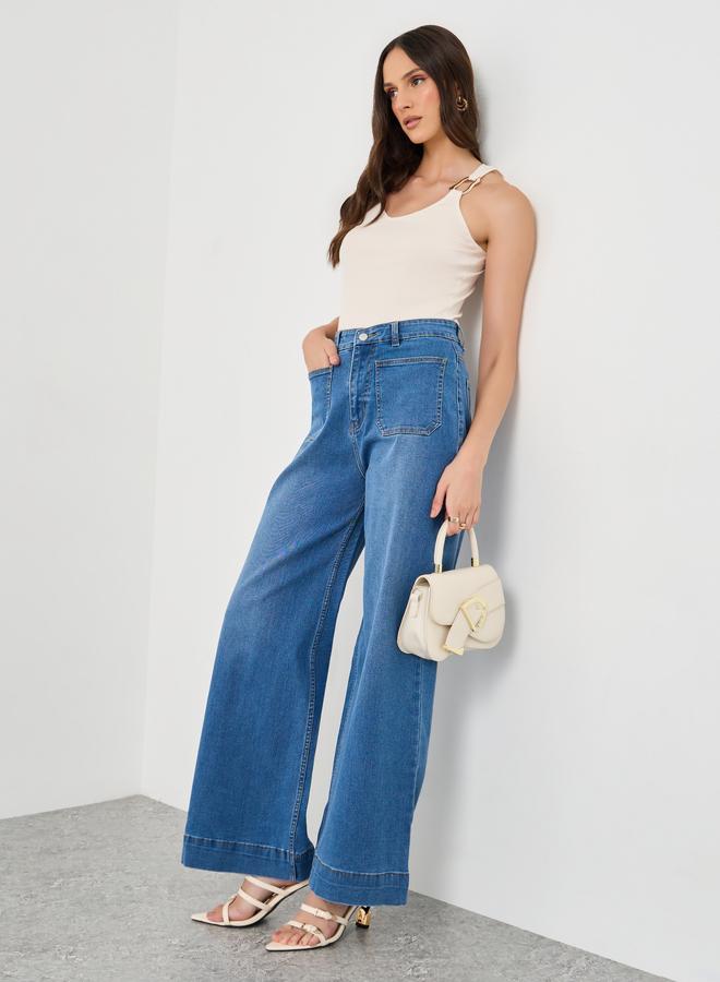 ستايلي جينز واسع الساق بخصر متوسط وجيب مرقع - Image 1