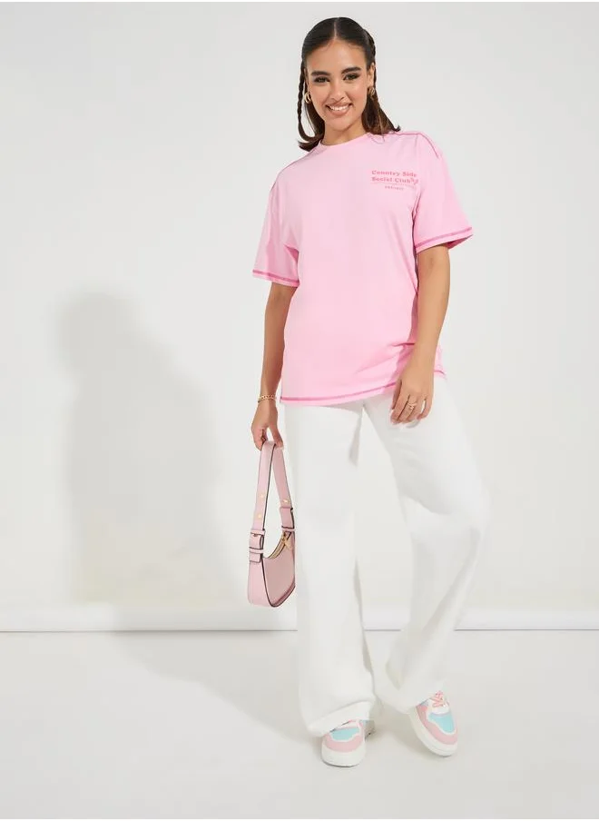 Styli Oversized Slogan Print Contrast Stitch T-Shirt with Dropped Shoulder