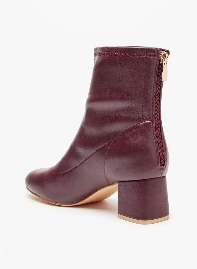 سيليست بوت نسائي بكعب عريض وسحاب