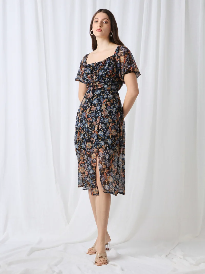 جلو باص فستان ميدي نسائي أزرق بياقة مربعة وأكمام منفوشة وطبعات زهور وتفاصيل ربط