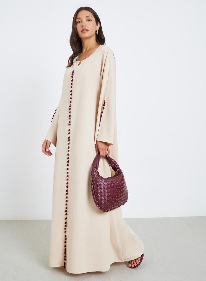 Styli Women Beige Abaya with Pom Pom Detail - Image 1