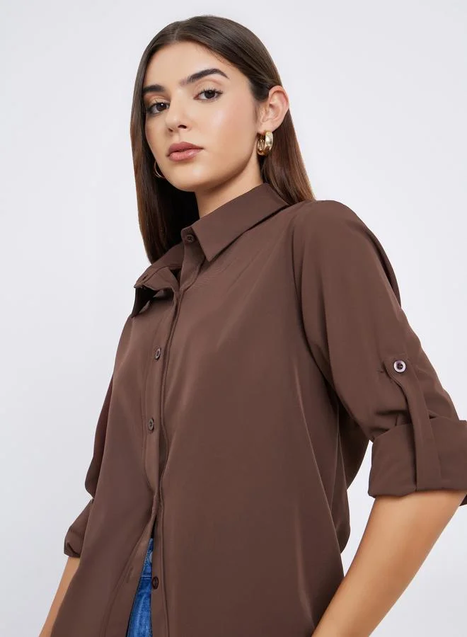 ستايلي قميص واسع بأكمام قابلة للطي