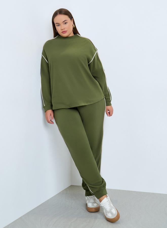 Styli Women Plus Size Green Striped Joggers - Image 1