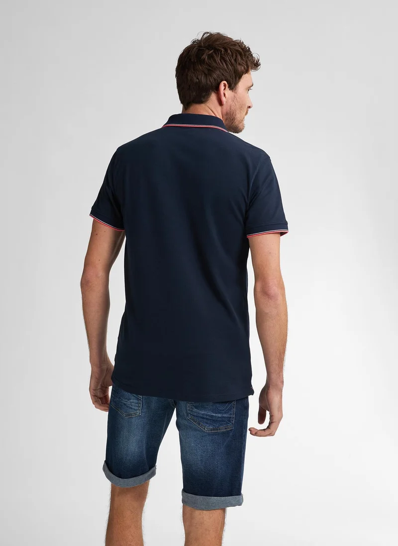 بترول اندستريز بولو رجالي قصير الأكمام