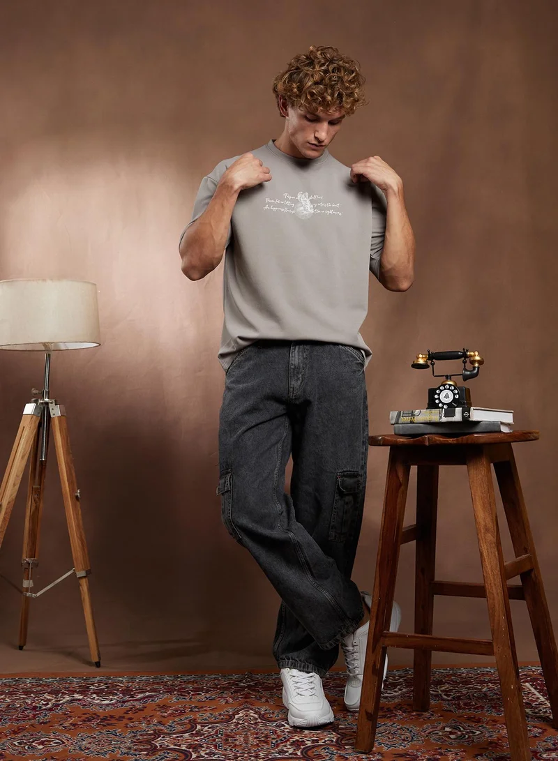Campus Sutra Campus Sutra Men's Coin Grey Boxy Mytho-Modernism T-Shirt For Casual Wear | Crew Neck | Short Regular Sleeves | Pull On Closure | T-Shirt Crafted With Comfort Fit For Everyday Wear