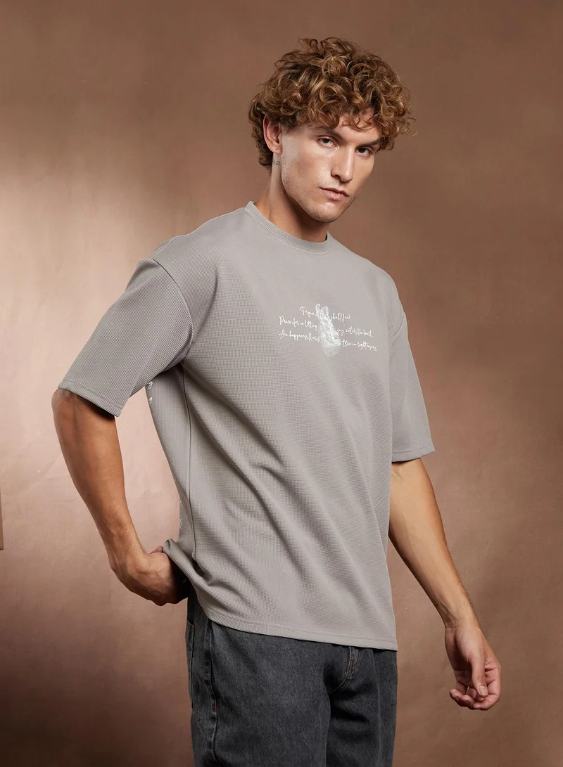 Campus Sutra Campus Sutra Men's Coin Grey Boxy Mytho-Modernism T-Shirt For Casual Wear | Crew Neck | Short Regular Sleeves | Pull On Closure | T-Shirt Crafted With Comfort Fit For Everyday Wear
