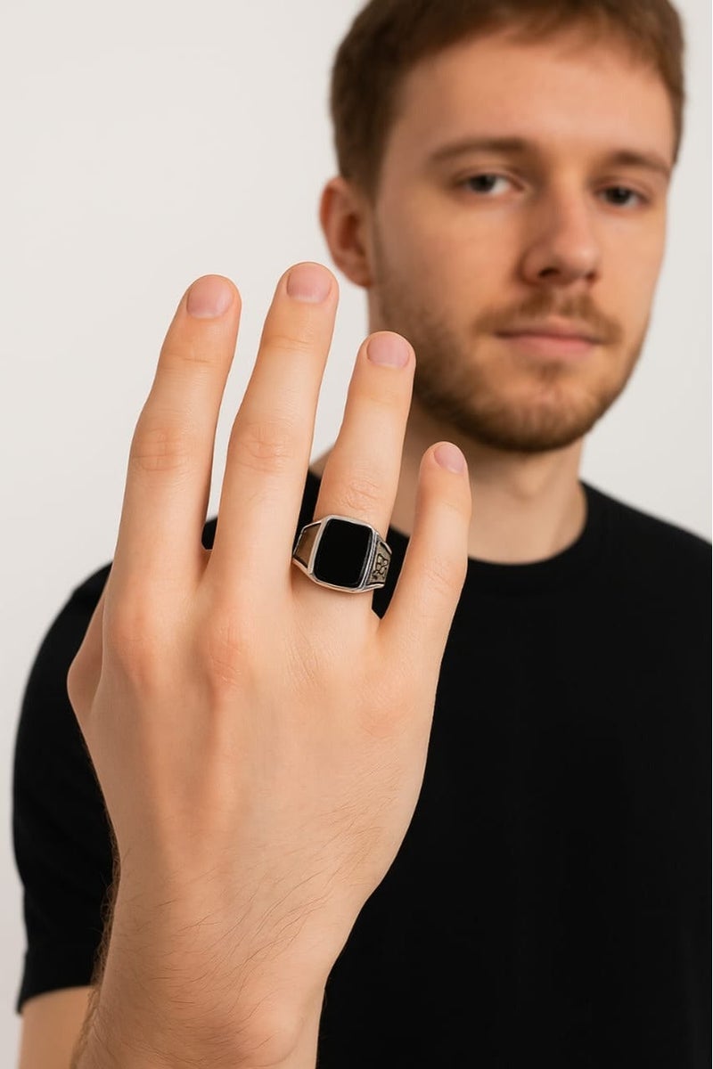 ROMAD A stylish silver ring with a rectangular black stone and elegant Arabic engravings on the sides. - Image 3