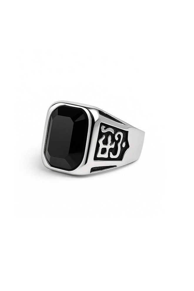 ROMAD A stylish silver ring with a rectangular black stone and elegant Arabic engravings on the sides. - Image 1