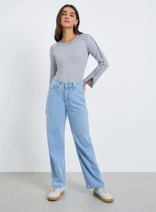 ستايلي جينز بأرجل واسعة بلمسة غسيل