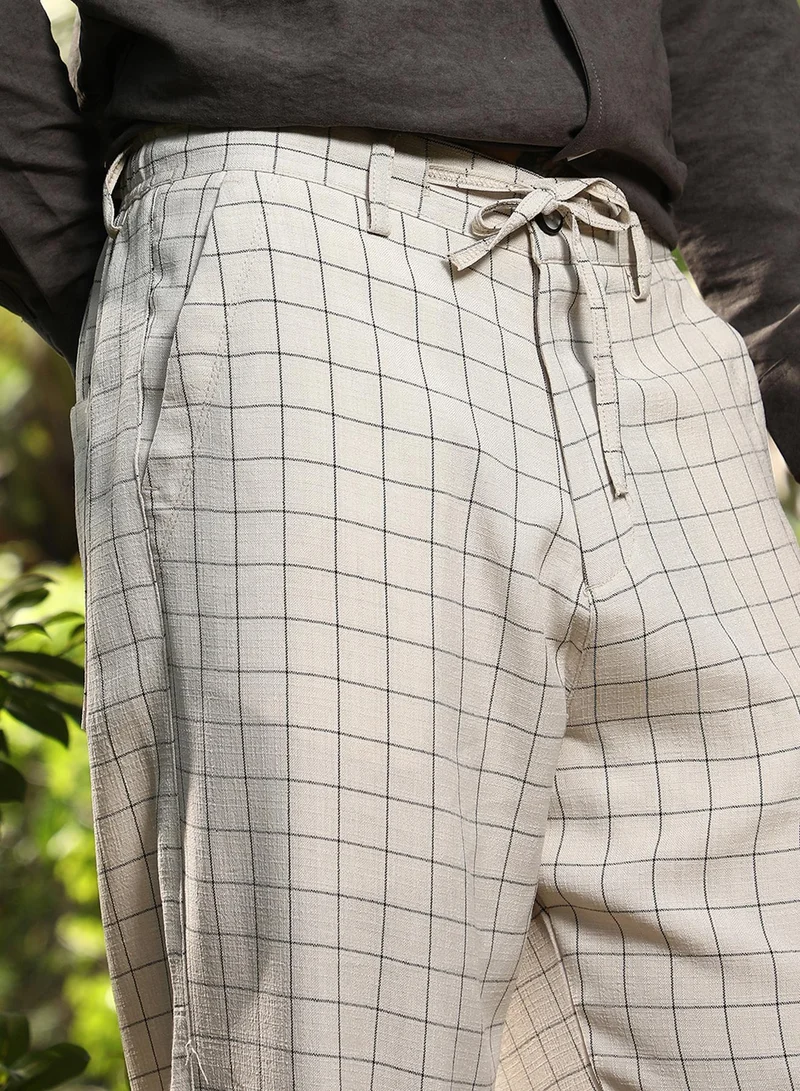 Campus Sutra Campus Sutra Men's Off-White Graph-Check Casual Trousers For Casual Wear | Mid-Rise | Regular Fit | Drawstring Closure | Trousers Crafted With Comfort Fit For Everyday Wear