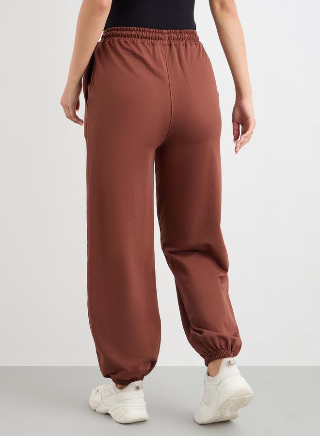 Styli Brown Tapered Joggers with Graphic Print - Image 4