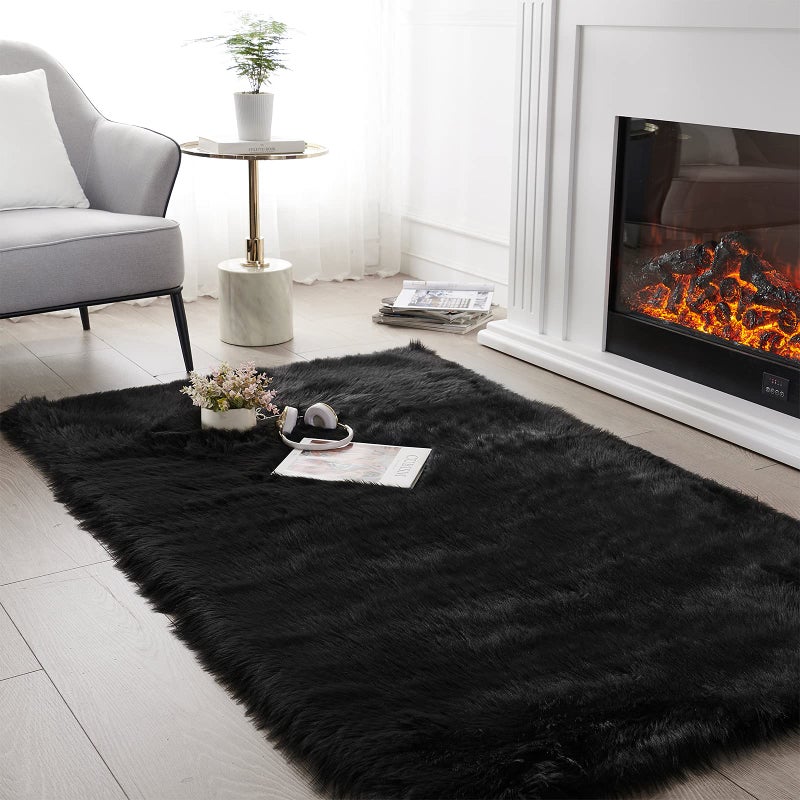SERISSA Soft Fluffy Area Rug Coal Black Faux Sheepskin Fur Rug Shaggy Rug for Bedroom Floor Fuzzy Carpet for Living Room 4x6 Feet