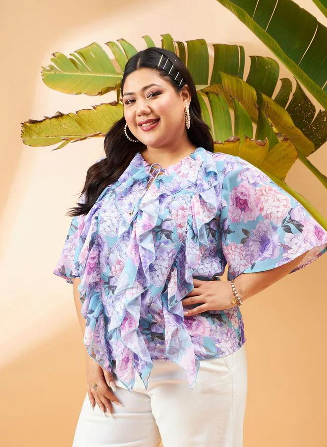 SASSAFRAS Plus Floral Print Top with Tie-Up Neck and Ruffled Detail by Styli