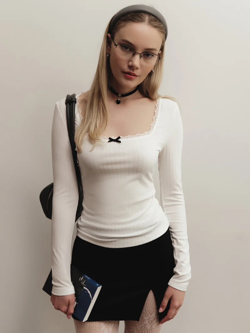 Lichi Textured jersey top with openwork and bow detailing