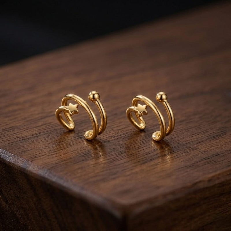 These elegant gold earrings, featuring a double design adorned with a delicate star and a sparkling, prominent ball, offer exceptional luxury. They require no ear piercing for easy wear and all-day comfort. - Image 5