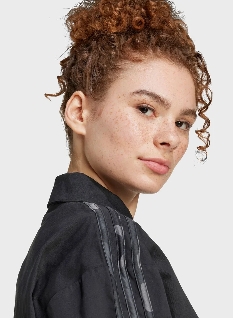 adidas جاكيت بطبعة مموهة و3 خطوط