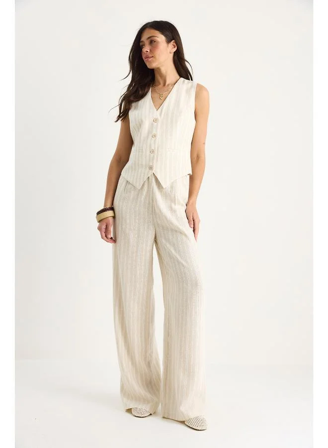 جينجر طقم بلوزة وبنطلون بقصة مريحة