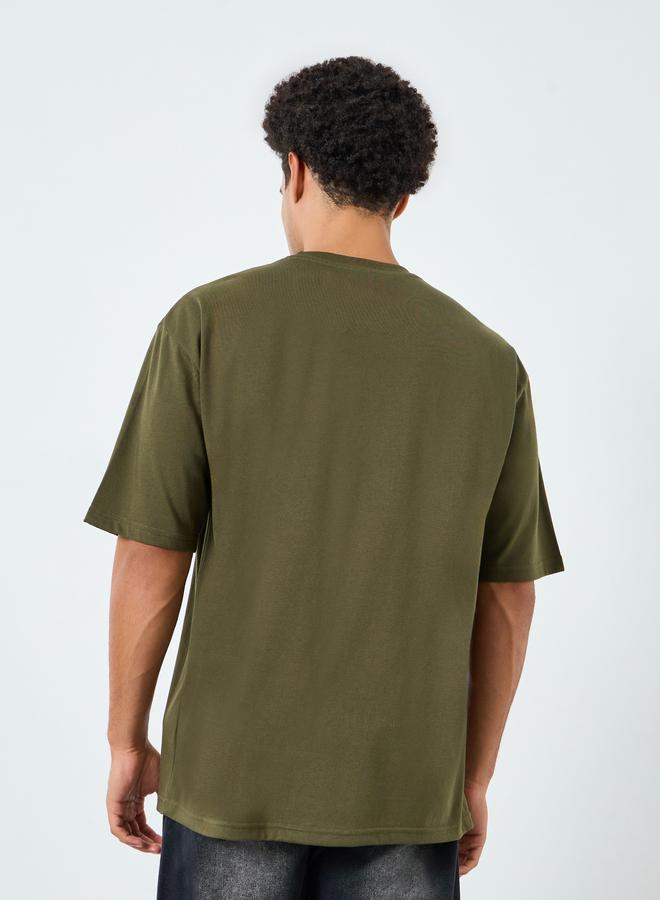 Styli Men Olive Graphic Print Oversized T-Shirt - Image 4