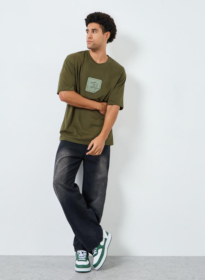 Styli Men Olive Graphic Print Oversized T-Shirt - Image 2