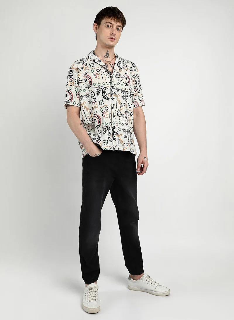 Campus Sutra Campus Sutra Men's Off-White Oversized Bohemian Shirt For Casual Wear | Cuban Collar | Short Sleeve | Button Closure | Shirt Crafted With Comfort Fit For Everyday Wear