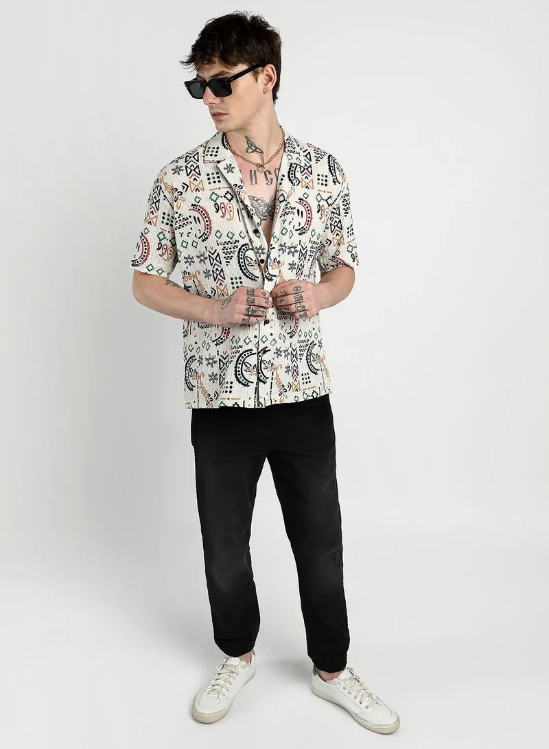 Campus Sutra Campus Sutra Men's Off-White Oversized Bohemian Shirt For Casual Wear | Cuban Collar | Short Sleeve | Button Closure | Shirt Crafted With Comfort Fit For Everyday Wear