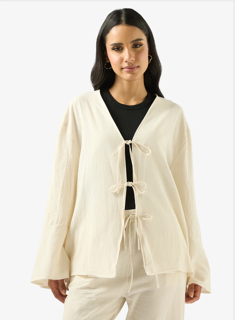 جينجر طقم بلوزة وبنطلون بقصة مريحة ورباط