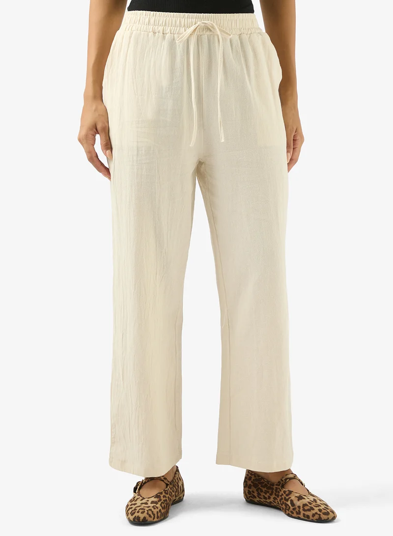 جينجر طقم بلوزة وبنطلون بقصة مريحة ورباط