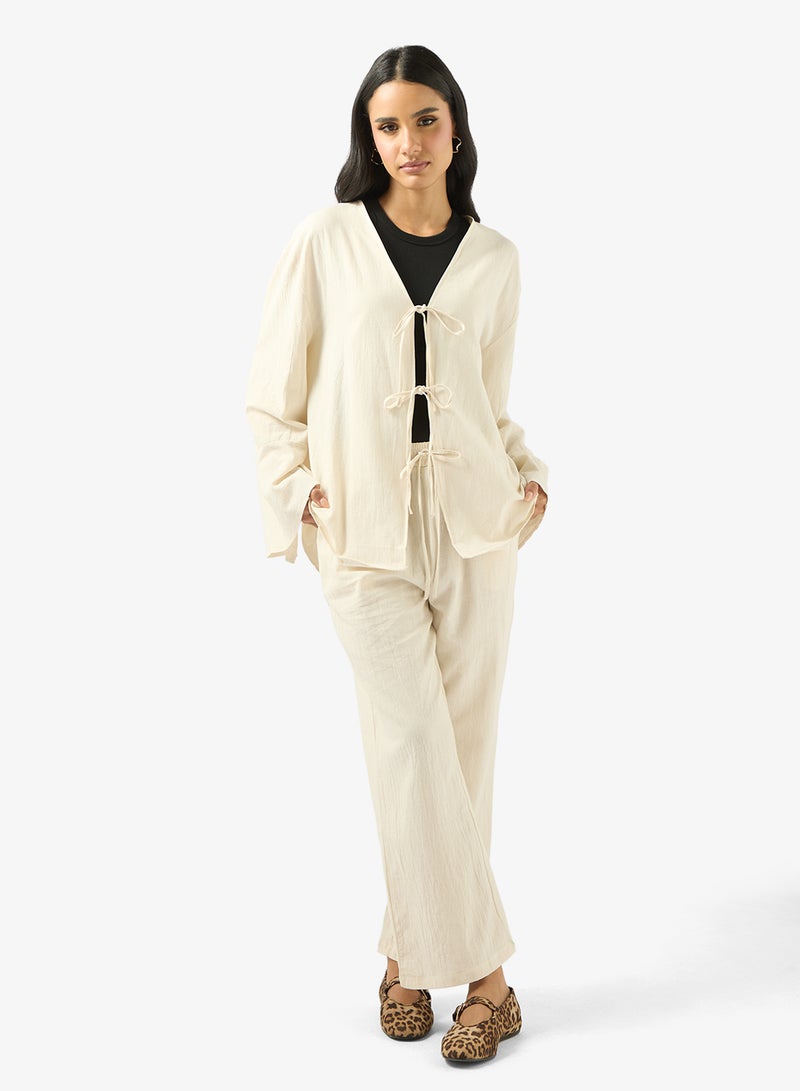 جينجر طقم بلوزة وبنطلون بقصة مريحة ورباط - Image 1