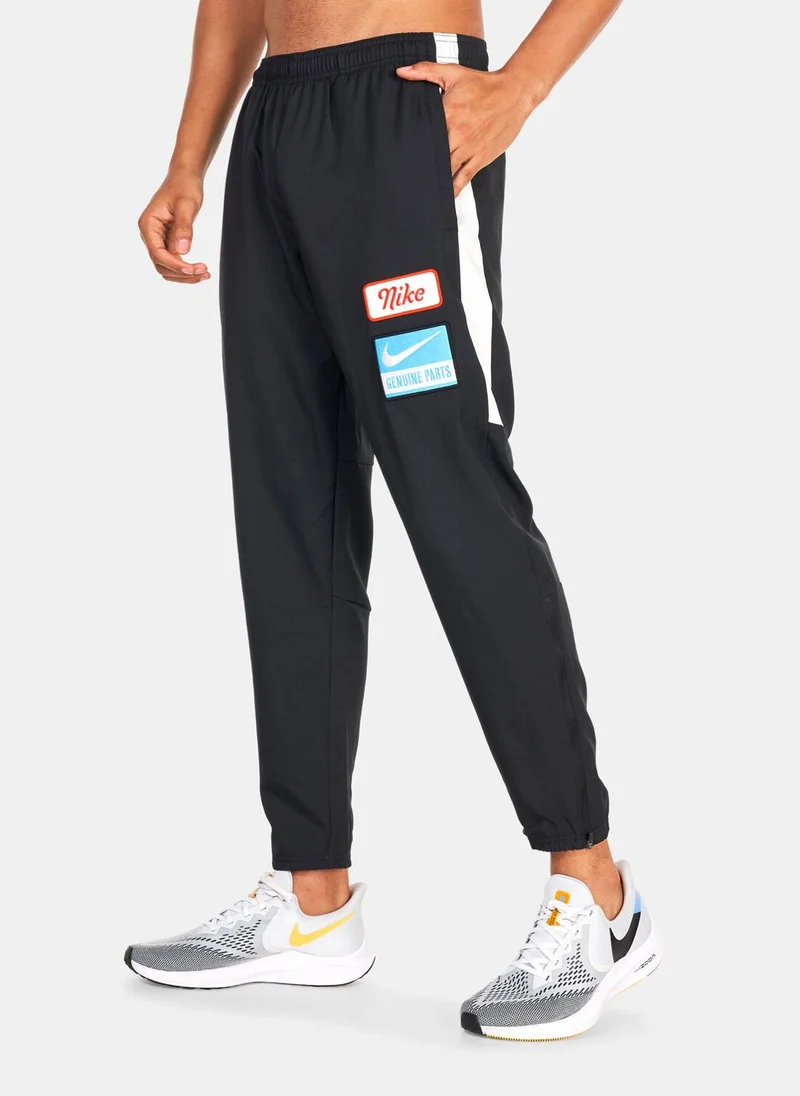 Nike Men’s Dri-FIT Challenger Woven Pants