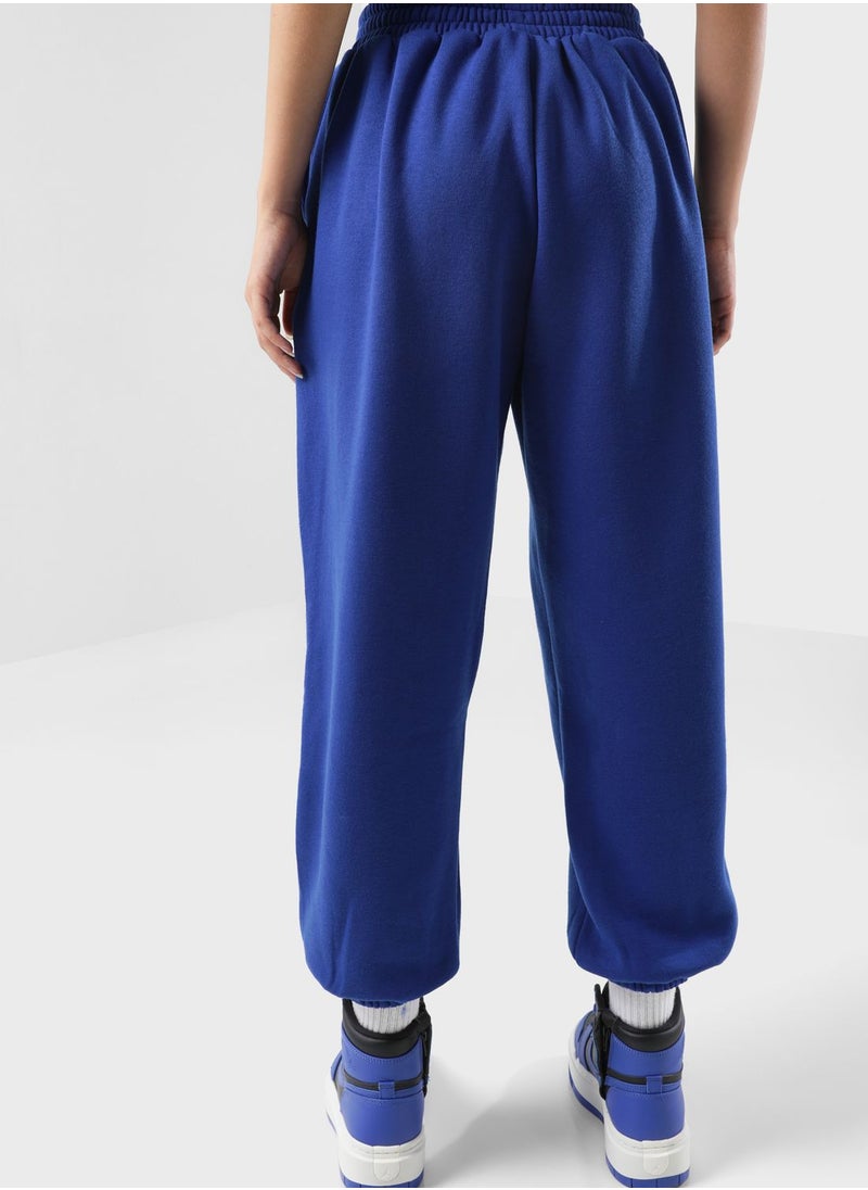 The Giving Movement - Oversized Racer Printed Joggers - Image 1