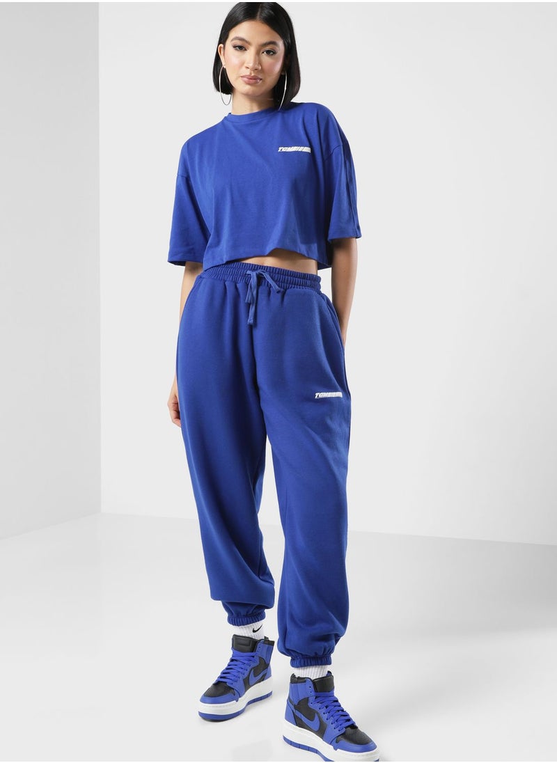 The Giving Movement - Oversized Racer Printed Joggers - Image 1