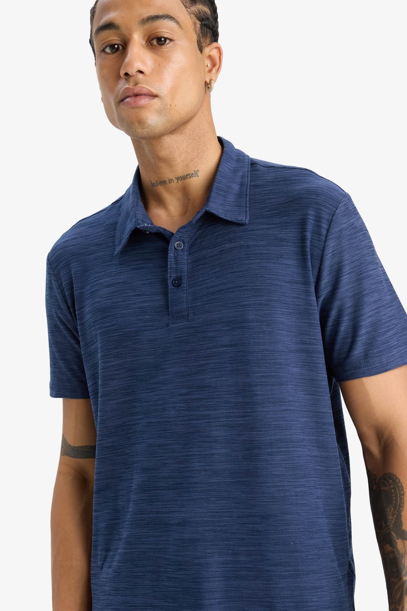 ديفاكتو تيشيرت بولو رياضي نص كم قصة عادية من DeFactoFit - Image 1