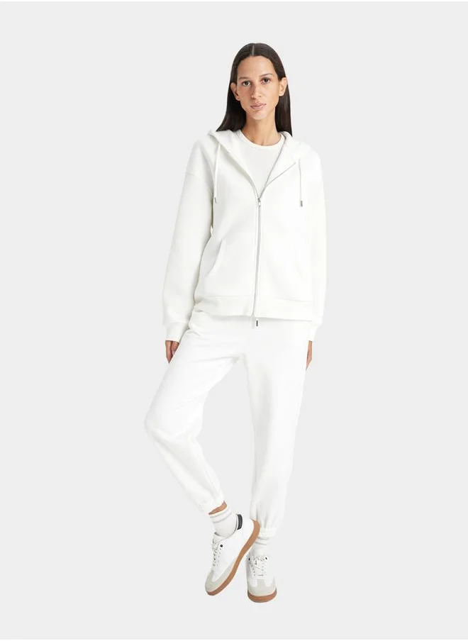 ديفاكتو Plain Hooded Relaxed Fit Zip-Up Sweatshirt by Styli