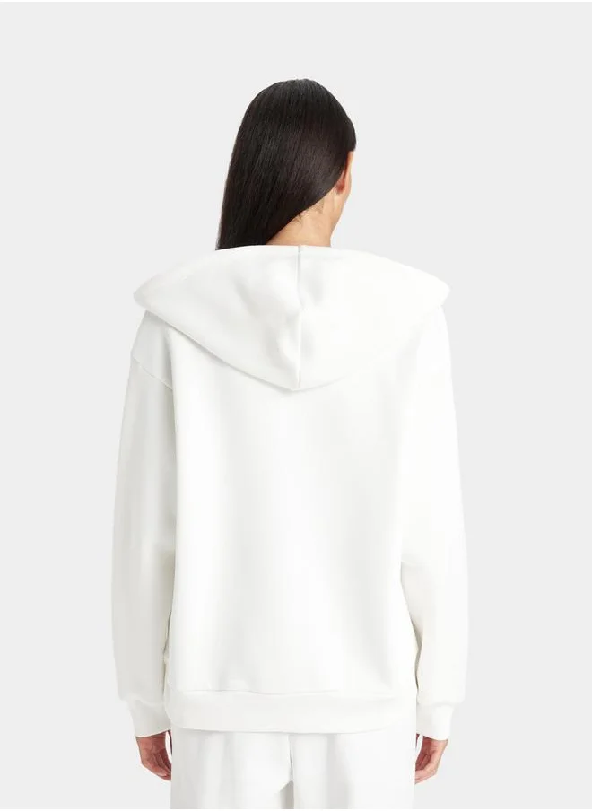ديفاكتو Plain Hooded Relaxed Fit Zip-Up Sweatshirt by Styli