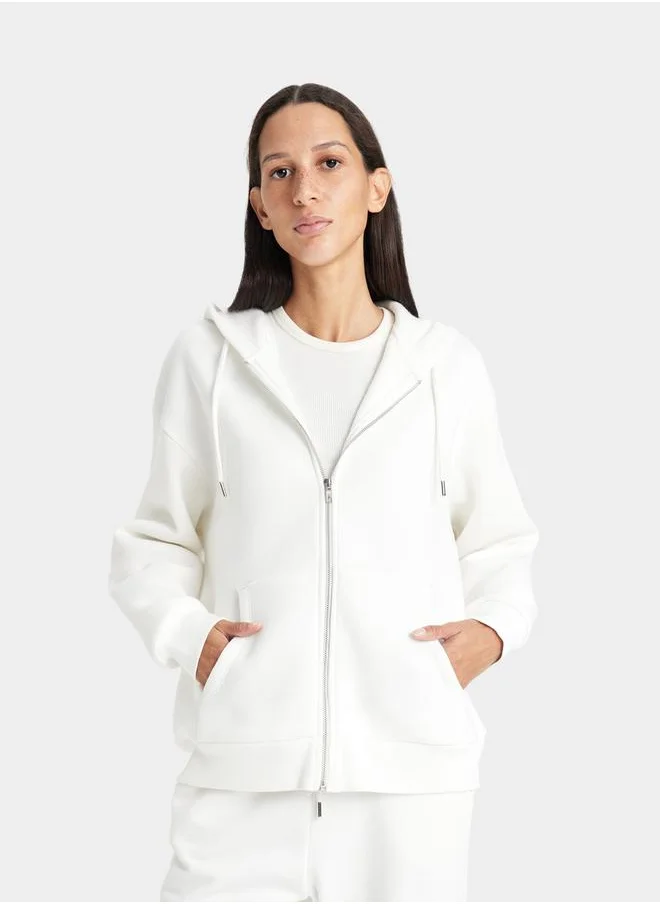 ديفاكتو Plain Hooded Relaxed Fit Zip-Up Sweatshirt by Styli