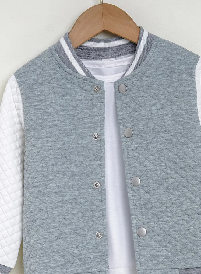 تايك تو جاكيت بلون رمادي بنمط كتل الألوان مزود بأزرار