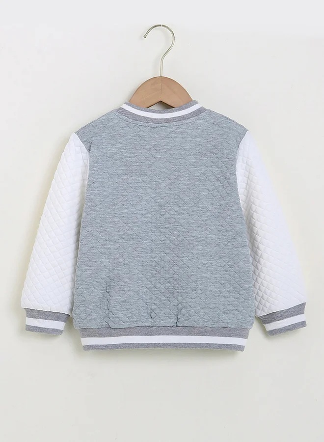 تايك تو جاكيت بلون رمادي بنمط كتل الألوان مزود بأزرار