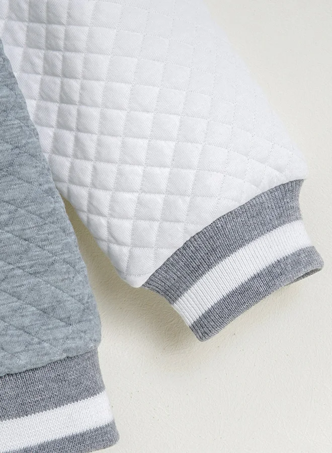 تايك تو جاكيت بلون رمادي بنمط كتل الألوان مزود بأزرار