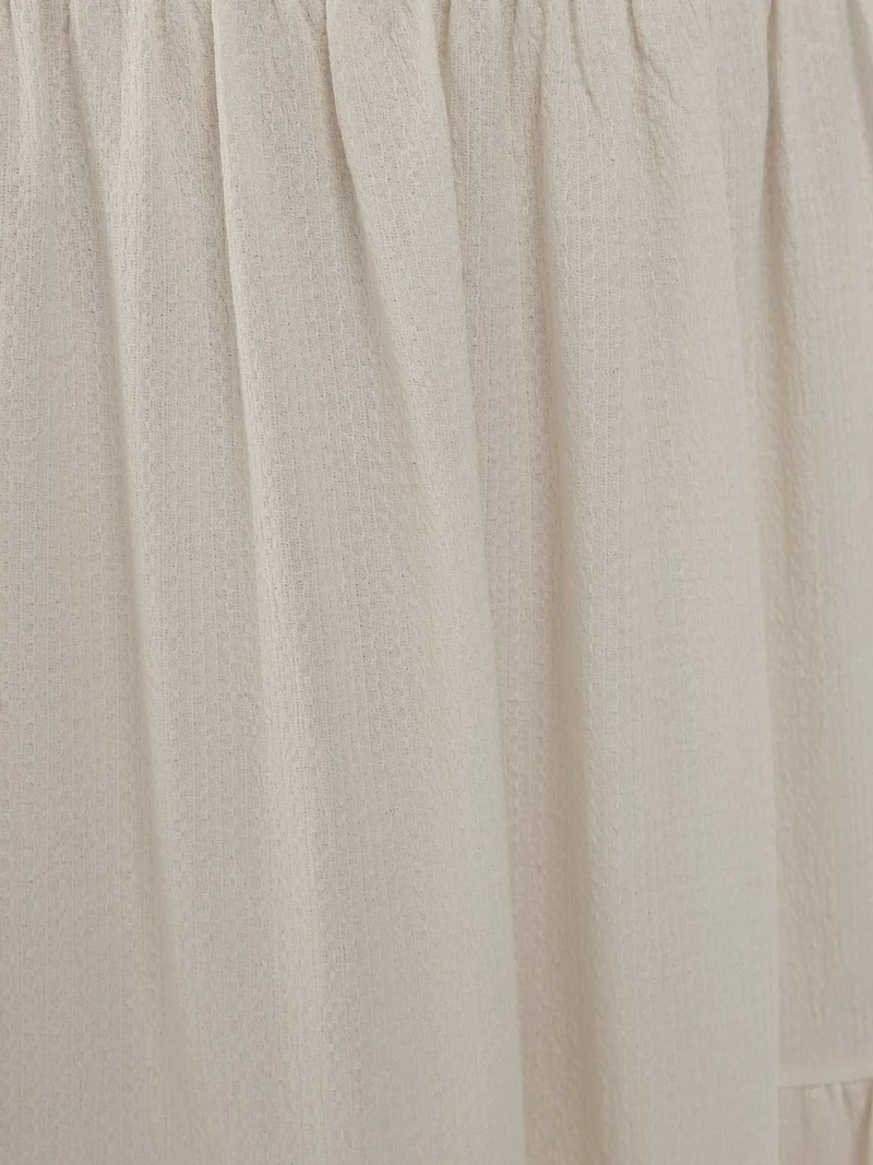 هيكاب تنورة ماكسي بنقوش بارزة بخصر عالٍ