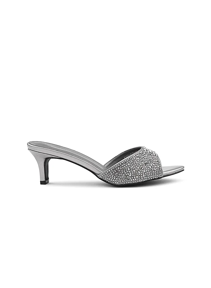 أيقون Women's slipper with a comfortable low heel.