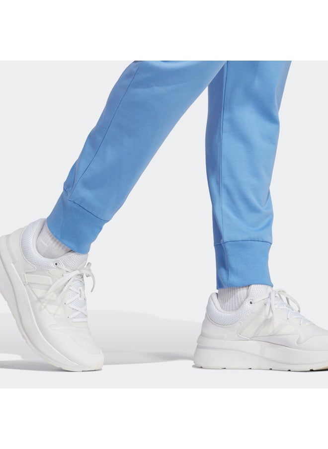 Adidas - بنطلون رياضي Essentials Single Jersey ذو أكمام مدببة - Image 1
