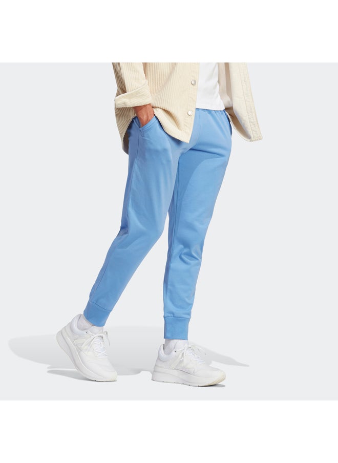 Adidas - بنطلون رياضي Essentials Single Jersey ذو أكمام مدببة - Image 1