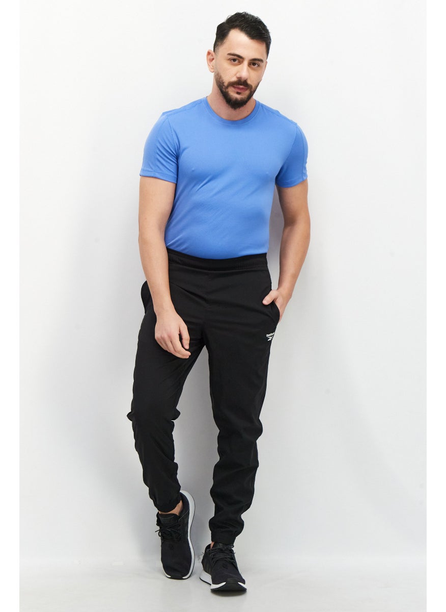 Reebok Men Sportswear Fit Brand Logo Training Jogger Pants, Black  - Image 4
