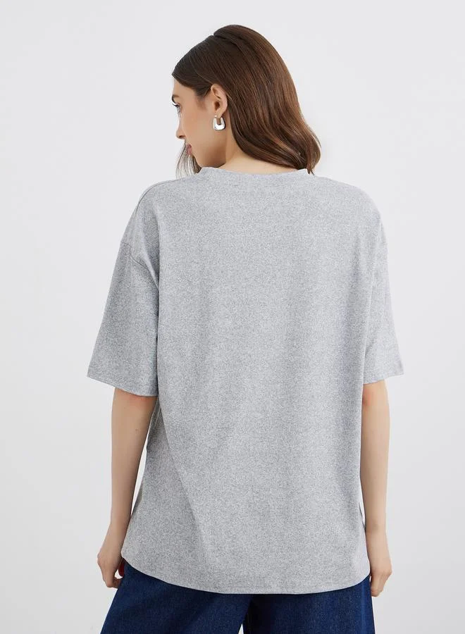 تايك تو Take Two Embroidered Round Neck Oversized T-Shirt