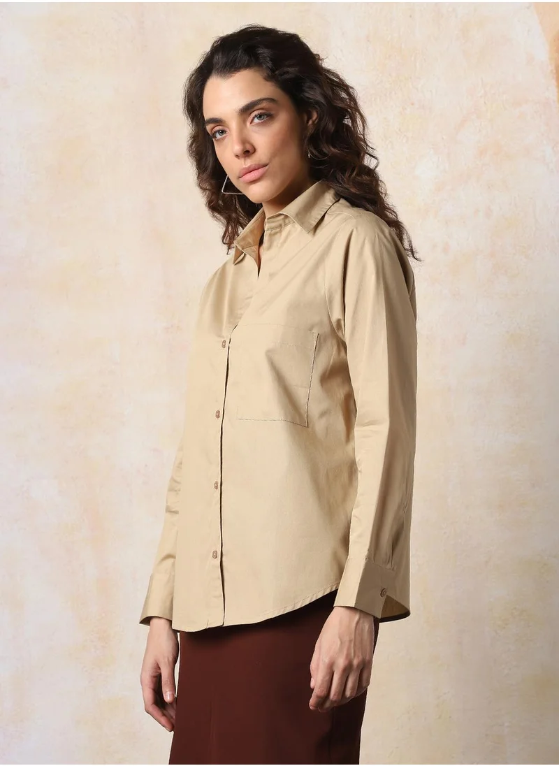 HIGH STAR Stay effortlessly stylish with this comfortable Beige Oversized Shirts Solid design crafted from 100% Cotton featuring Long Sleeves with Button closure.