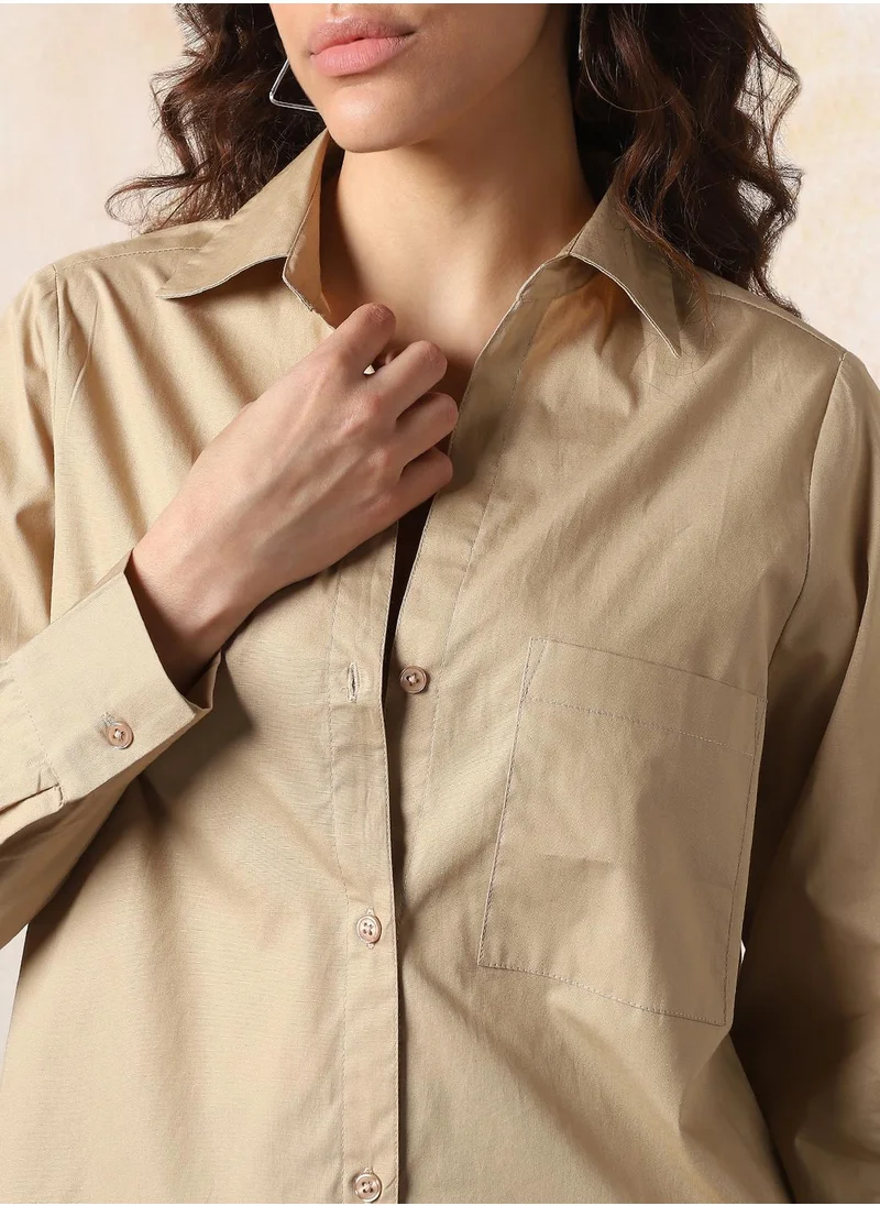 HIGH STAR Stay effortlessly stylish with this comfortable Beige Oversized Shirts Solid design crafted from 100% Cotton featuring Long Sleeves with Button closure.